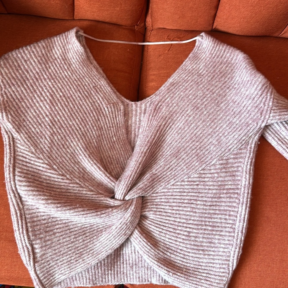 Anthropology wool sweater with a beautiful opening on a back. Pink